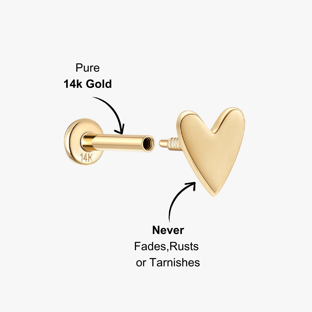 Timeless 14K gold heart stud earrings for a chic, minimalist look.