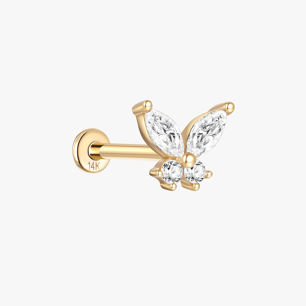 A close-up view of the 14K gold butterfly-shaped stud earring adorned with shimmering zirconia stones.