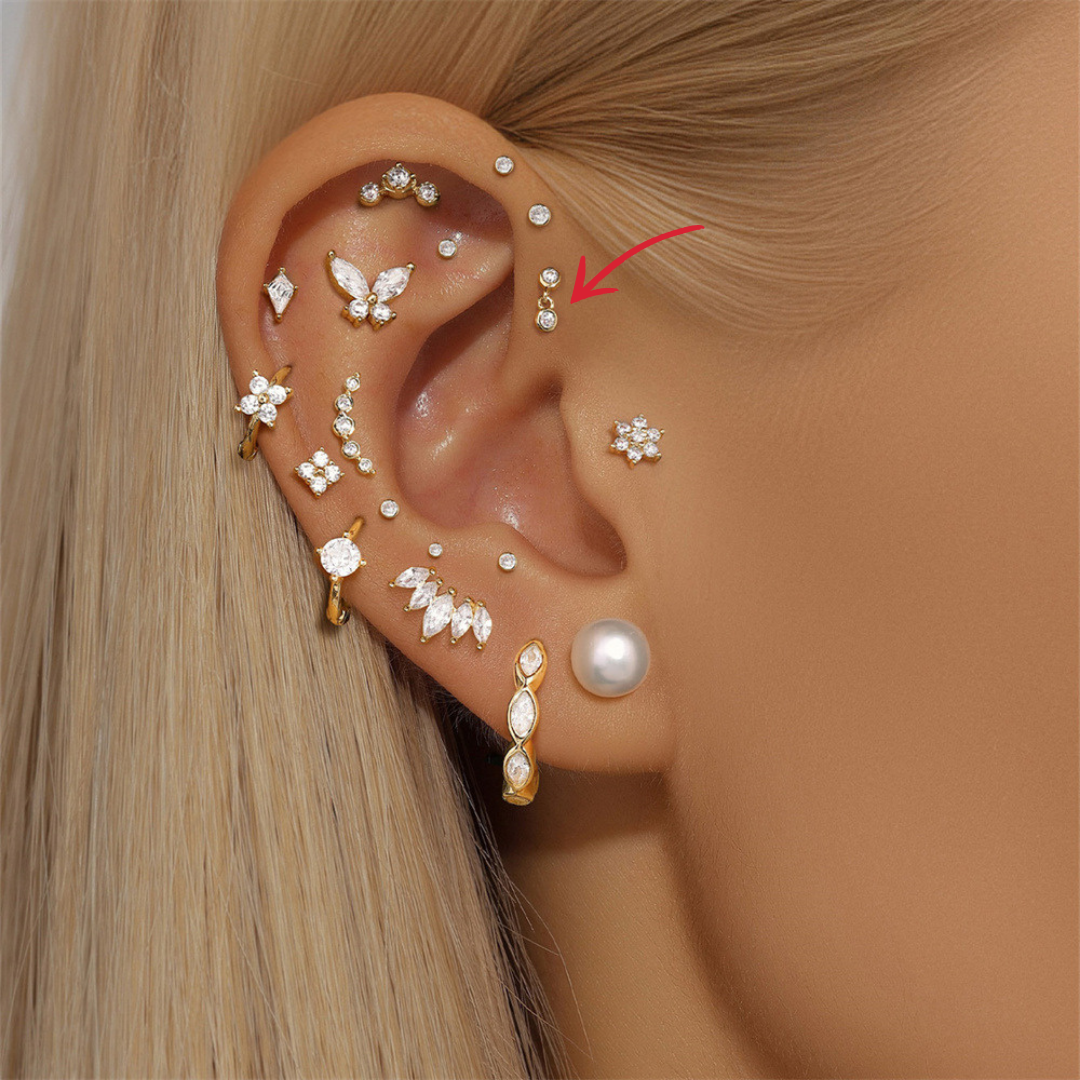 Elegant 14K gold zircon stud earring with a double-dangle design, perfect for everyday wear.