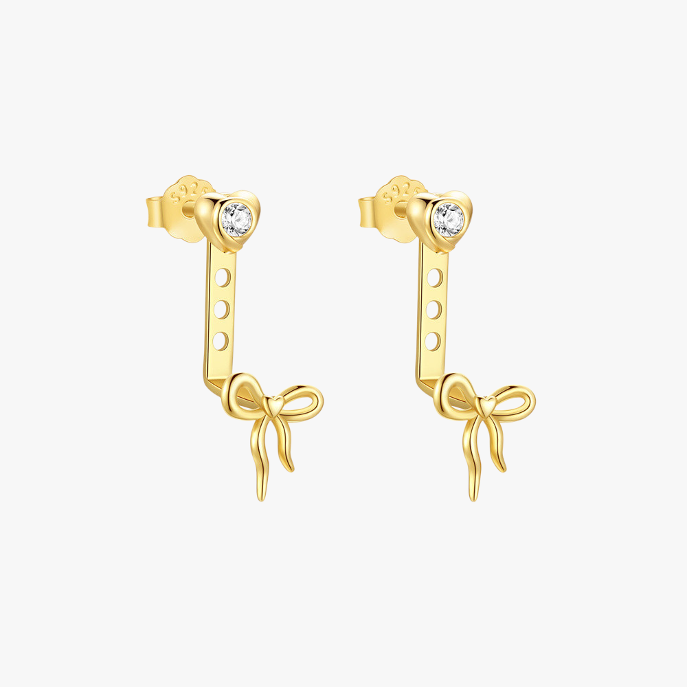 14k-gold-heart-bow-dangle-earrings-main.png – Charming 14k gold earrings with heart-shaped studs and elegant bow dangles, perfect for a sophisticated and playful look.