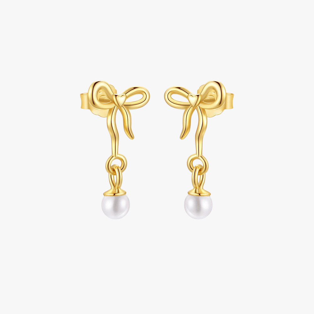 14k-gold-pearl-drop-bow-earrings-main.png – Elegant 14k gold earrings featuring bow designs with delicate pearl drops, perfect for adding a feminine touch to any outfit.