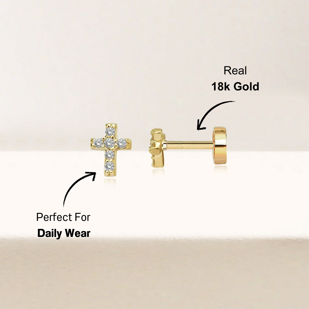 Side view of a 14K gold-plated cross-shaped stud earring with zirconia stones, showcasing its sleek profile and sparkle.