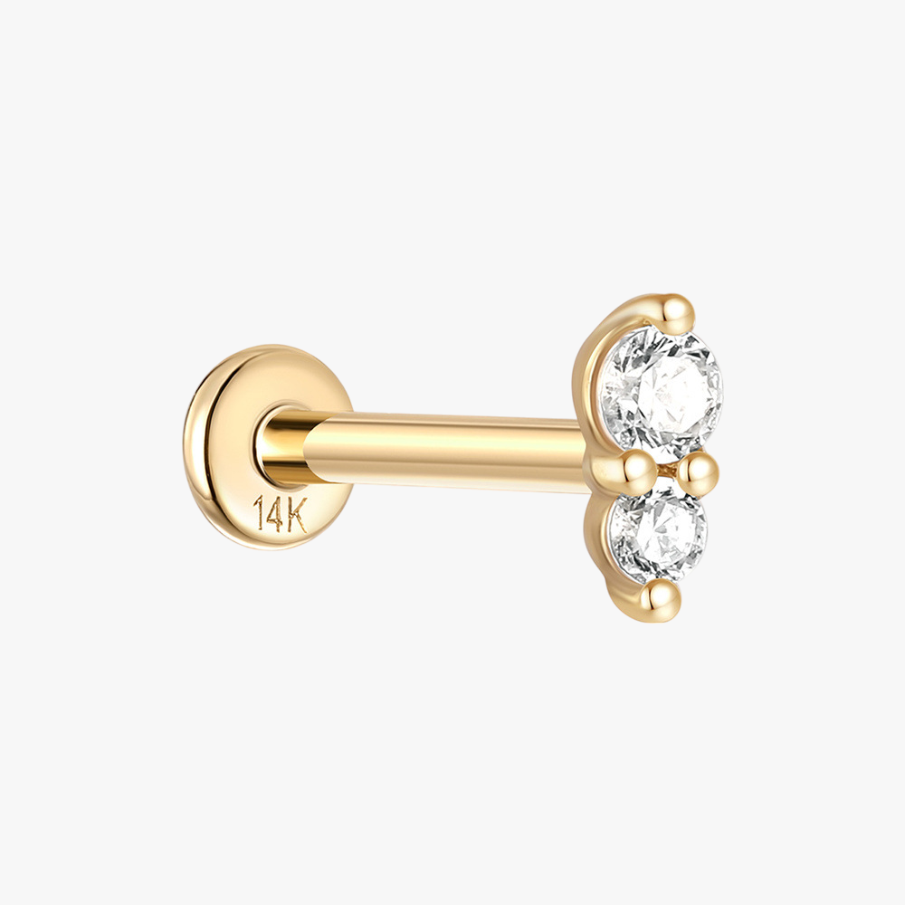 14K gold triple zircon stud earring with a modern geometric design.