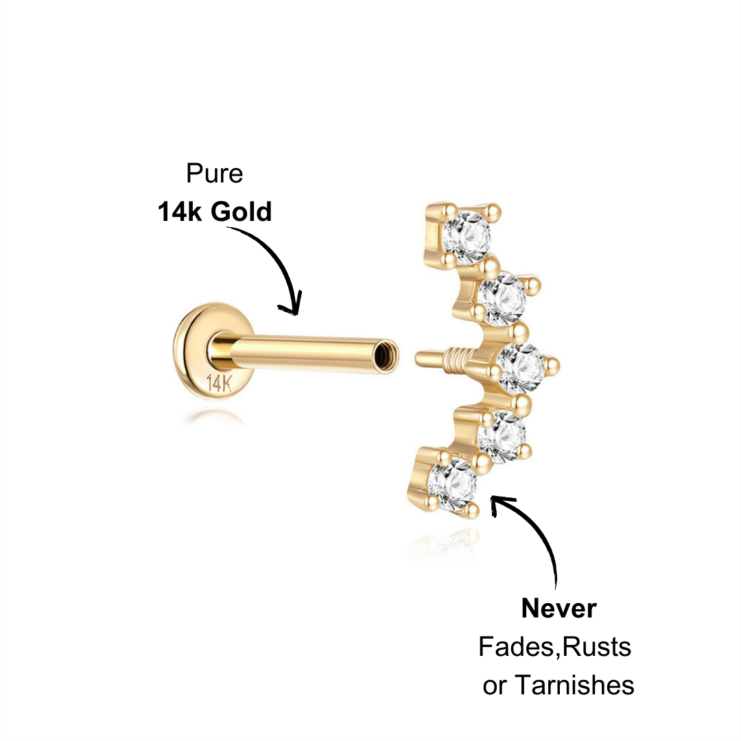 14K gold zircon cartilage earring with a unique curved shape and secure screw-back design.