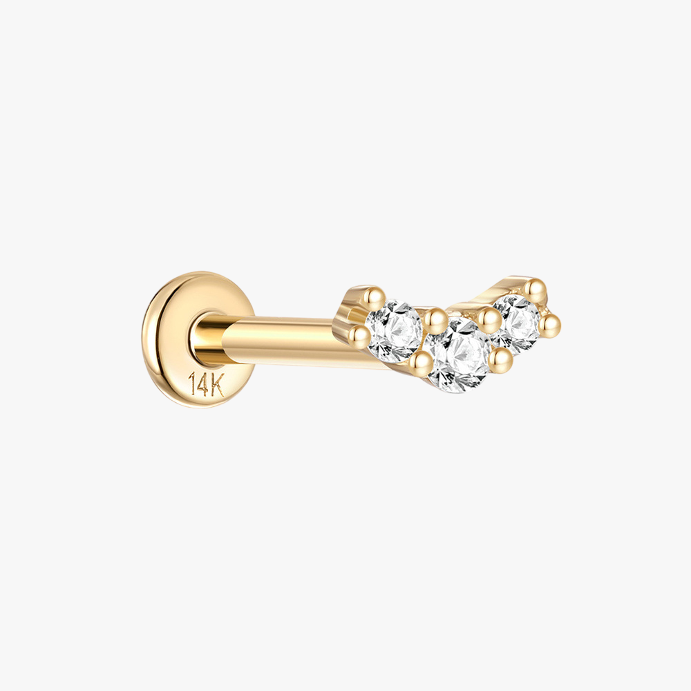 A front view of a 14K gold curved stud earring adorned with three sparkling zirconia stones.