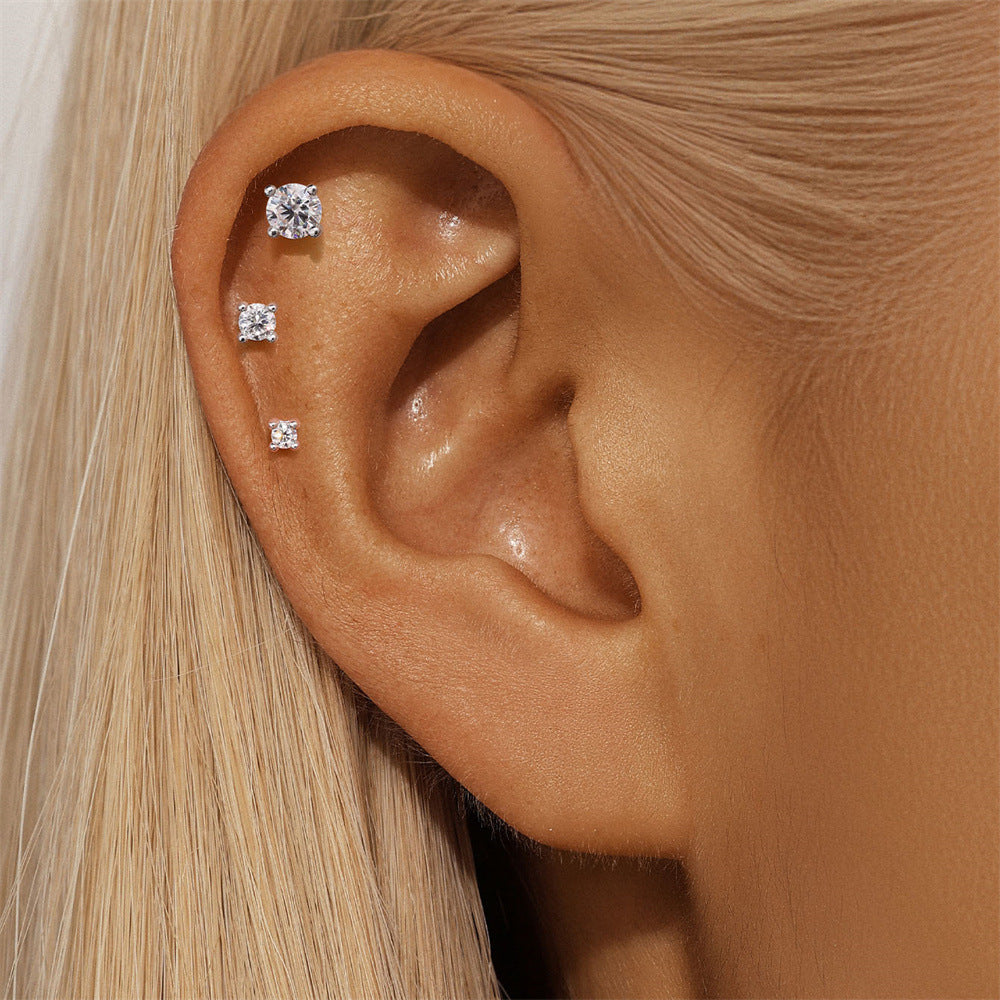 Close-up of 925 Sterling Silver Moissanite Square Stud Earrings (3mm) worn by model on ear, showcasing a minimalist and chic design.