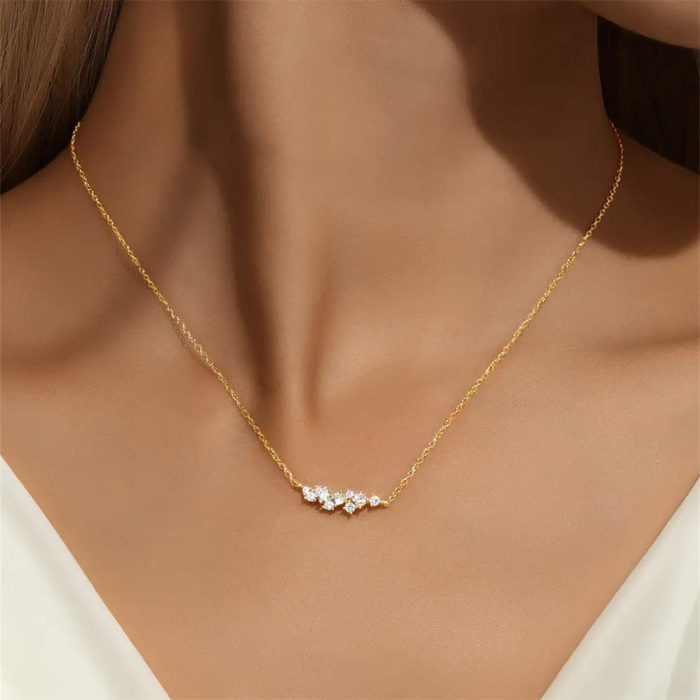 Model wearing the 925 Sterling Silver Geometric Zirconia Dainty Clavicle Necklace, showcasing its elegant design and sparkling zircons.