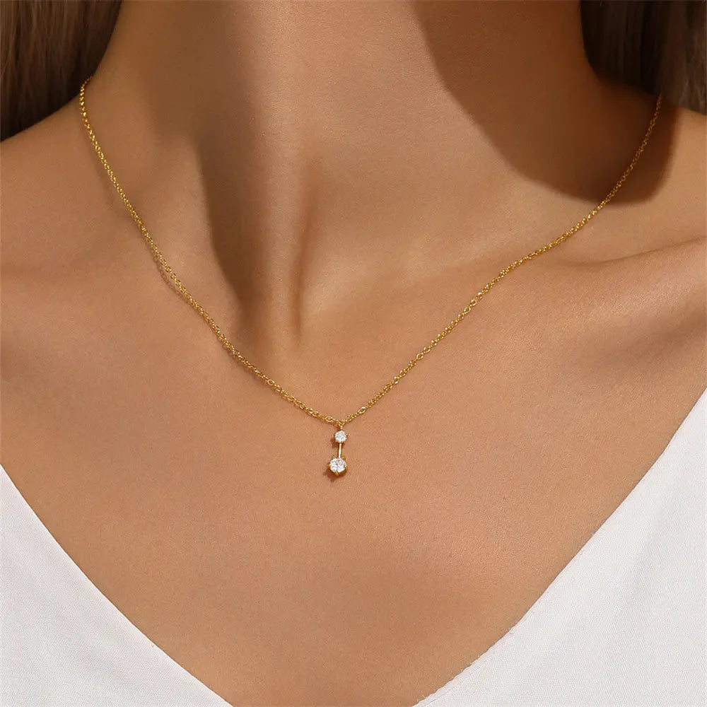 Model wearing 925 sterling silver necklace with zirconia pendant