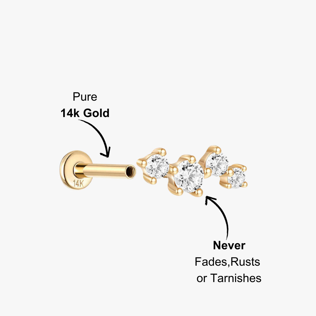 Gold stud earring with three sparkling zirconia stones