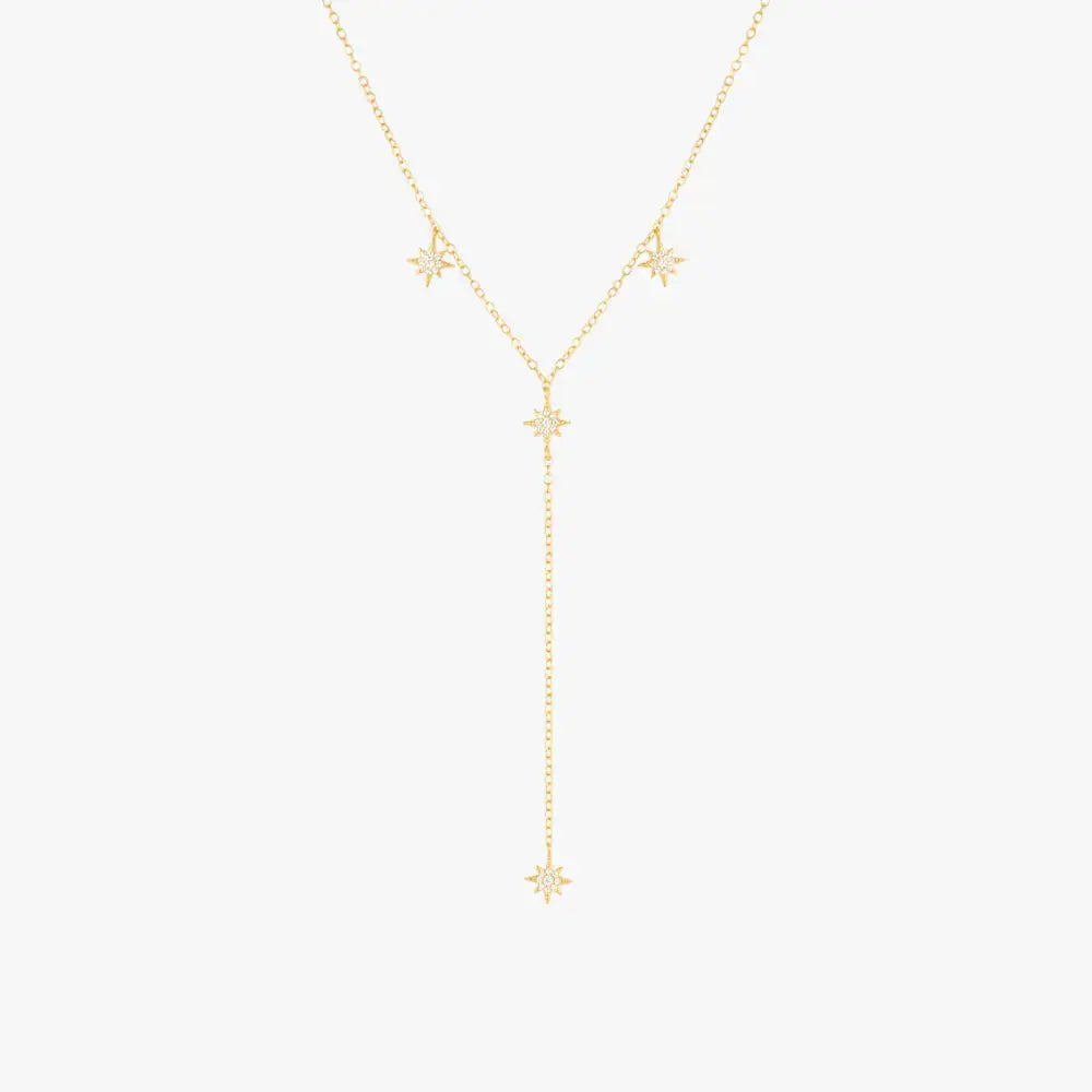 Collier long avec pendentif en forme d'étoile et pompon en forme de Y