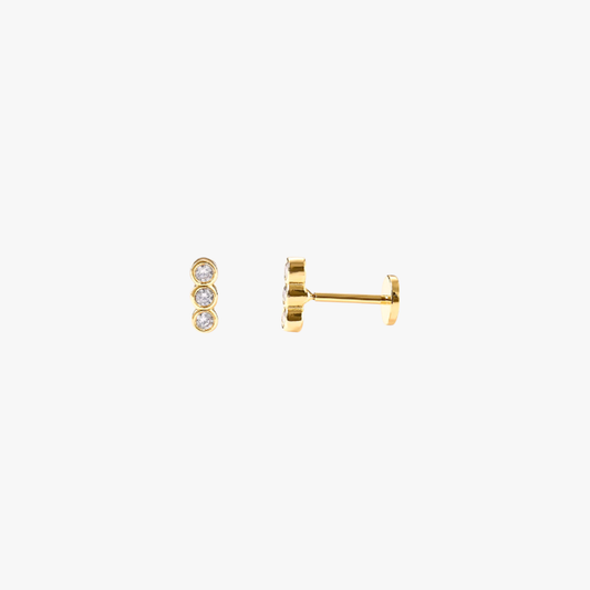  A pair of gold stud earrings with a diamond bar.