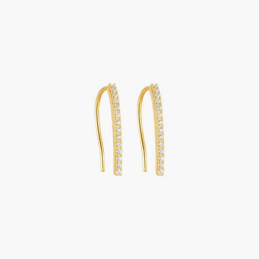 A pair of gold curved earrings with diamonds.