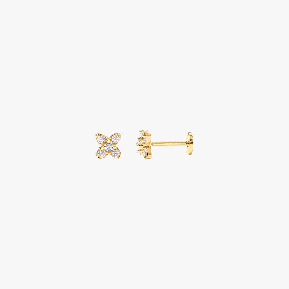 A pair of gold stud earrings with a flower design set with diamonds.