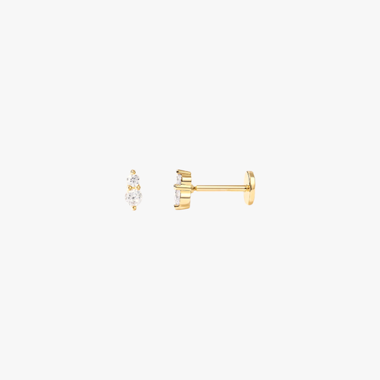  A pair of gold stud earrings with diamonds.