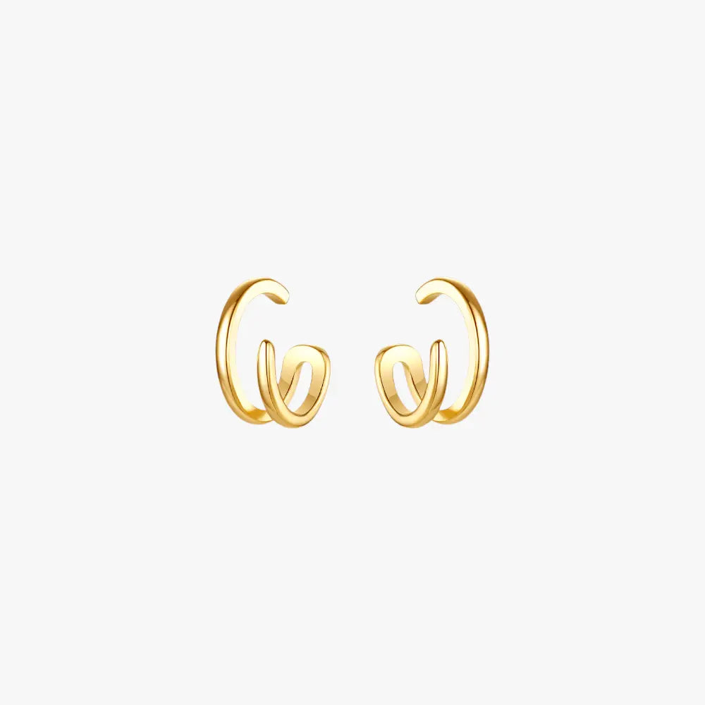 A pair of double gold hoop earrings.