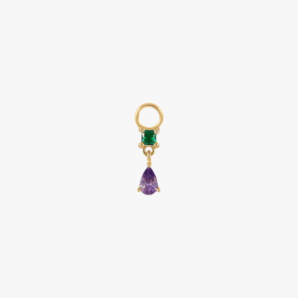 A gold charm with an emerald and amethyst.