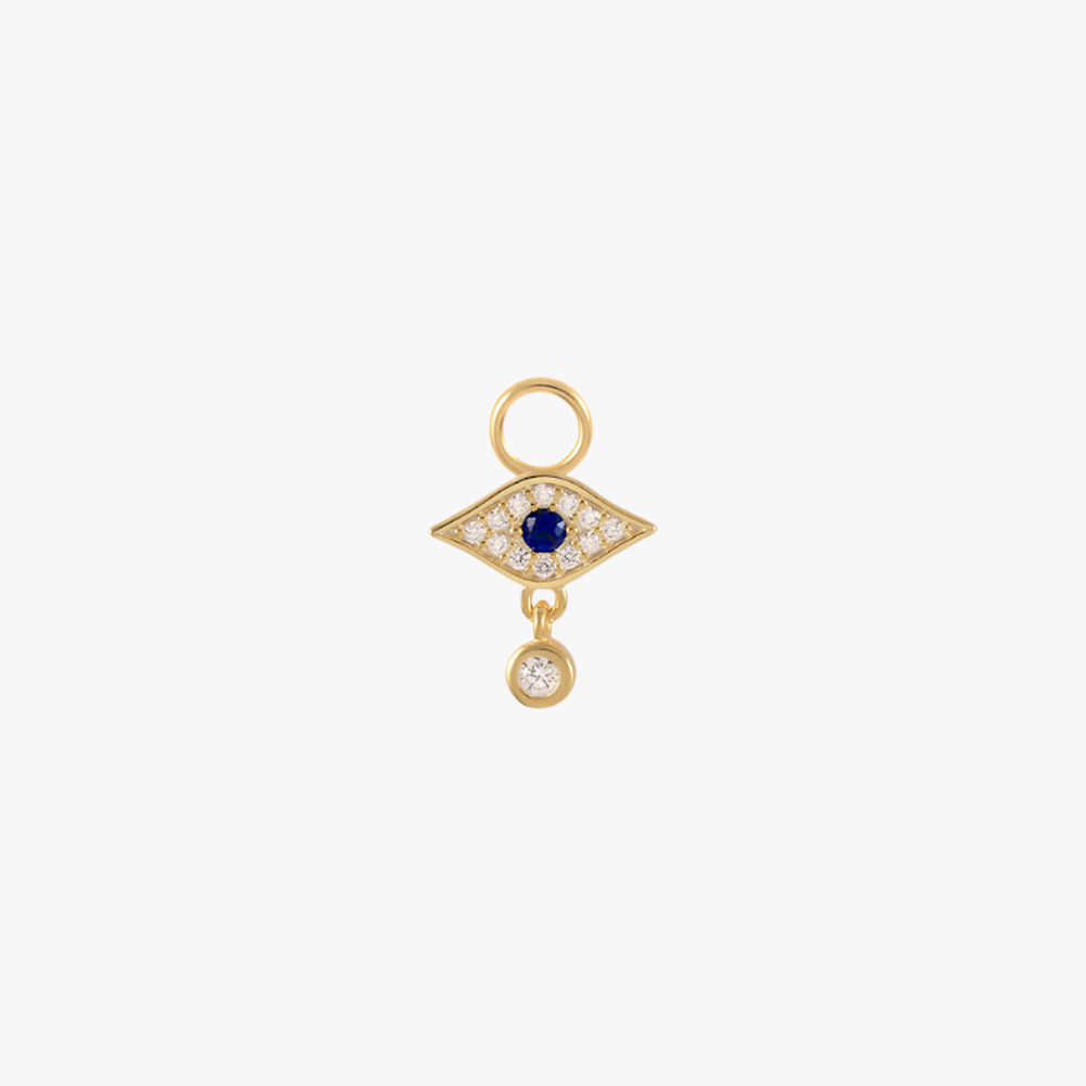 A gold evil eye charm.