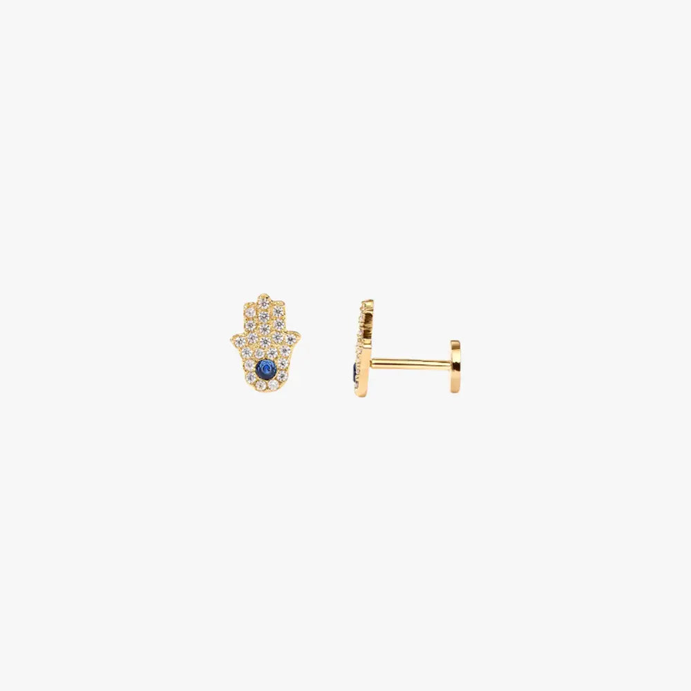 A pair of gold stud earrings with a hamsa design.