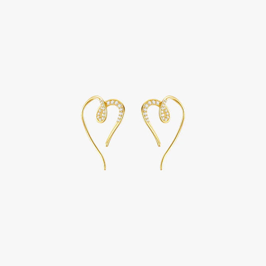 A pair of gold heart hoop earrings.