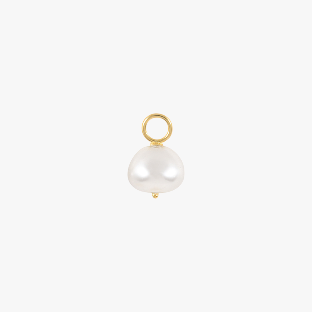 A gold charm with a pearl.