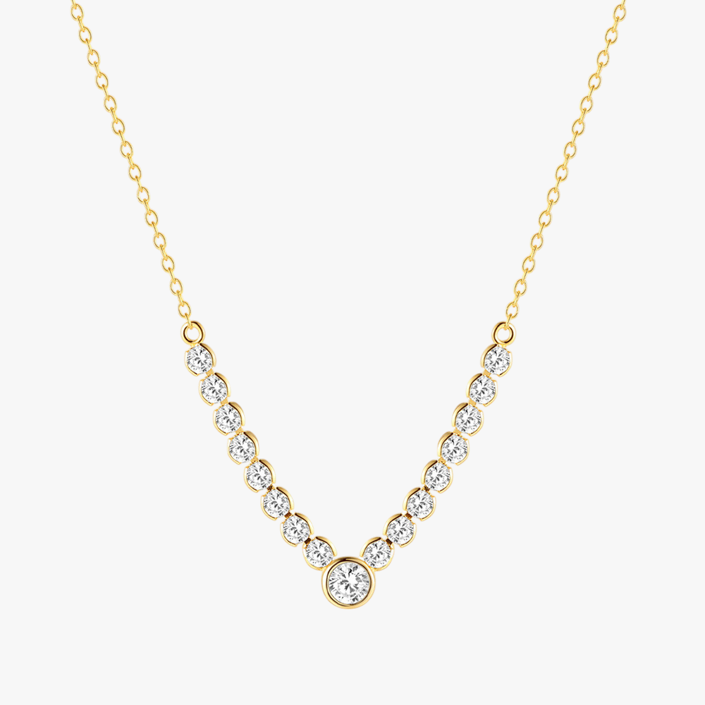 Elegant V-shaped necklace with sparkling cubic zirconia stones, gold-plated for a timeless look.