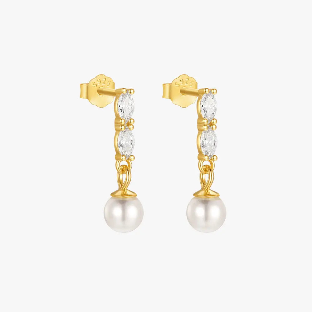 Elegant gold-plated sterling silver pearl drop earrings with sparkling marquise-shaped cubic zirconia stones, perfect for sophisticated occasions.