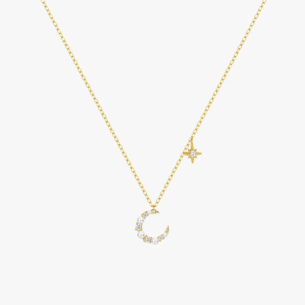 Gold crescent moon and star necklace crafted in 925 sterling silver with cubic zirconia embellishments, featuring a delicate chain design.