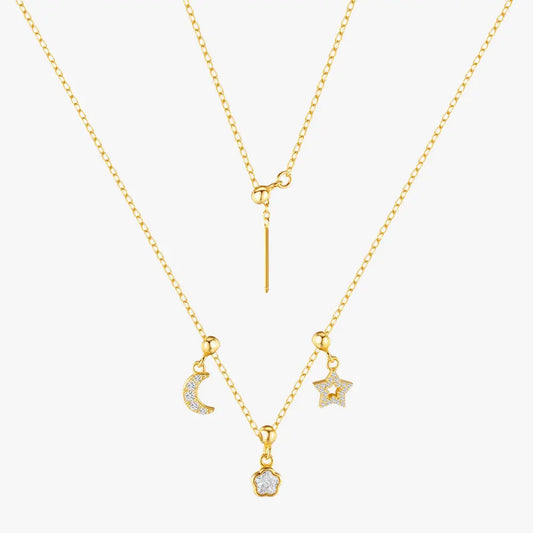 Gold necklace with moon, star, and floral-shaped pendants, crafted from 925 sterling silver.