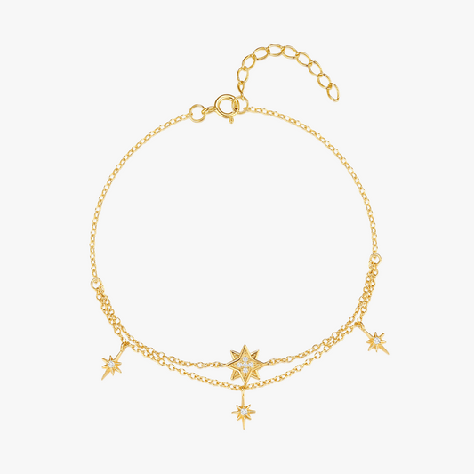 Elegant gold bracelet featuring a layered star charm design, made from pure 925 sterling silver.