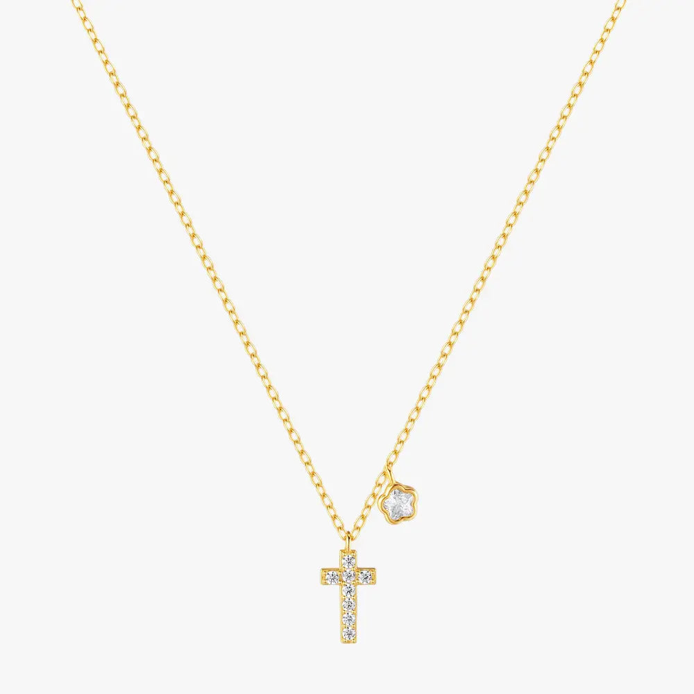 Gold cross necklace with floral charm made of 925 sterling silver and cubic zirconia, perfect for elegant and minimalistic styles.