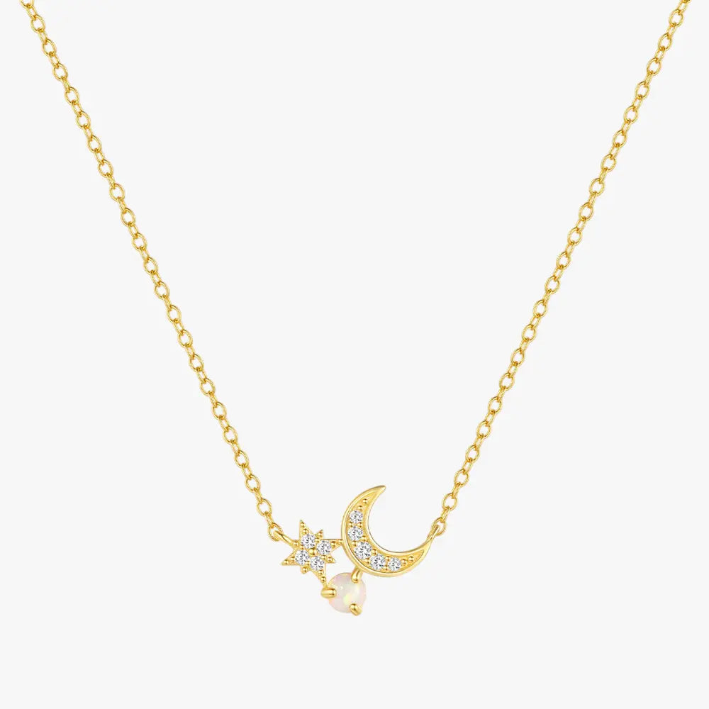 Gold necklace with crescent moon, star, and pearl charms, made from 925 sterling silver with gold plating.