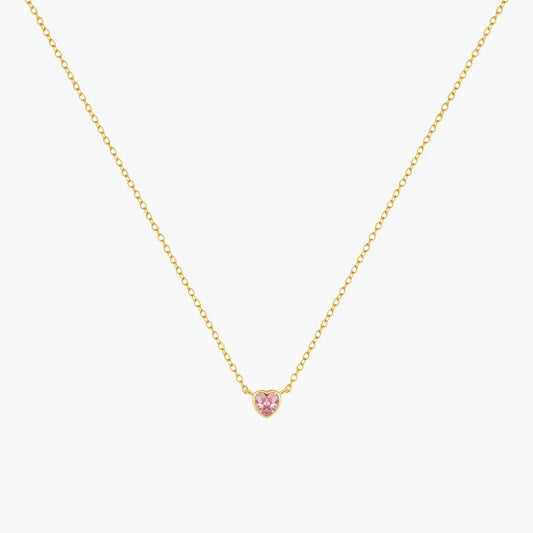 Elegant heart-shaped pink gemstone necklace, made from high-quality 925 sterling silver with a radiant gold finish, displayed on a white background.