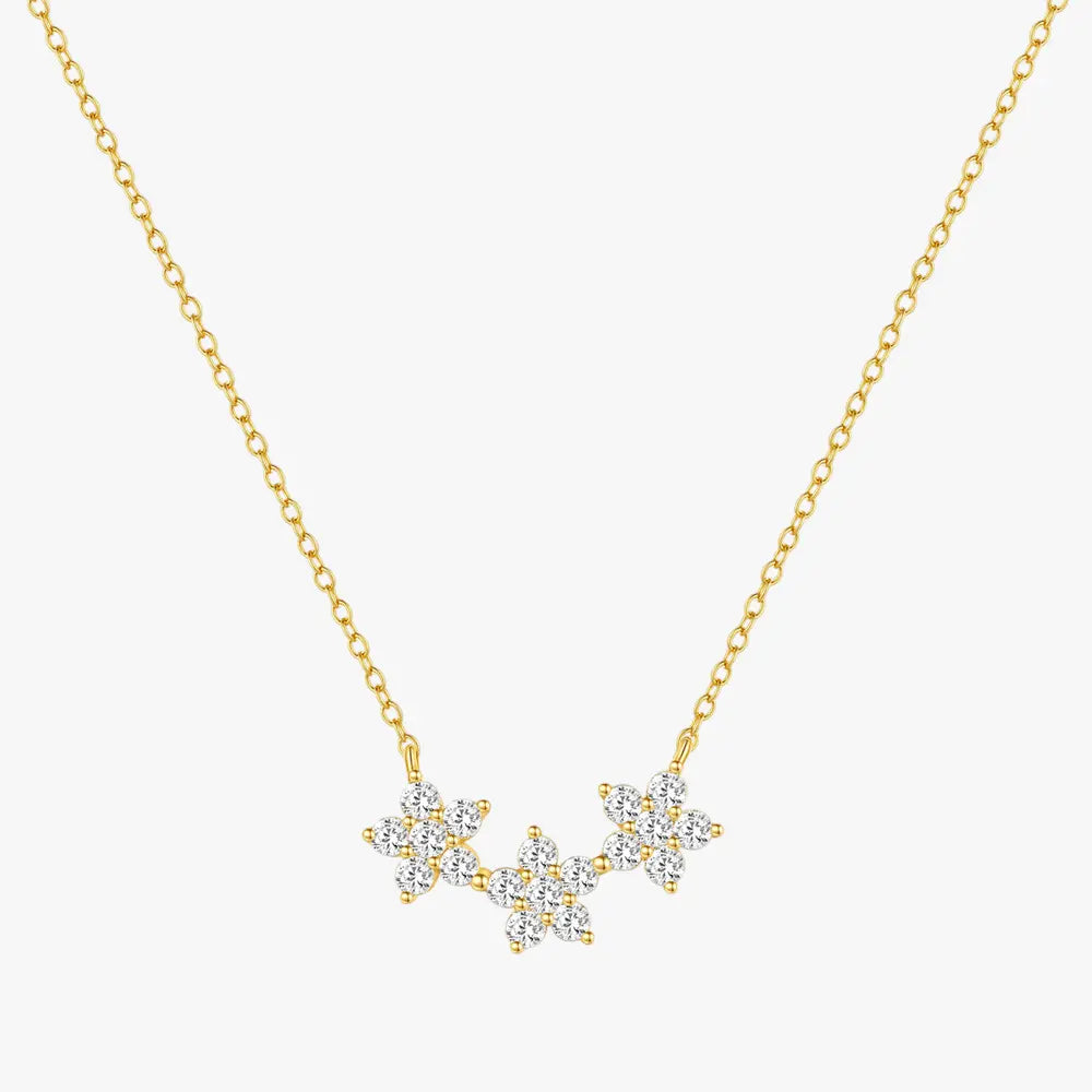 Gold necklace featuring three sparkling floral clusters made with cubic zirconia on a delicate chain, crafted from 925 sterling silver.