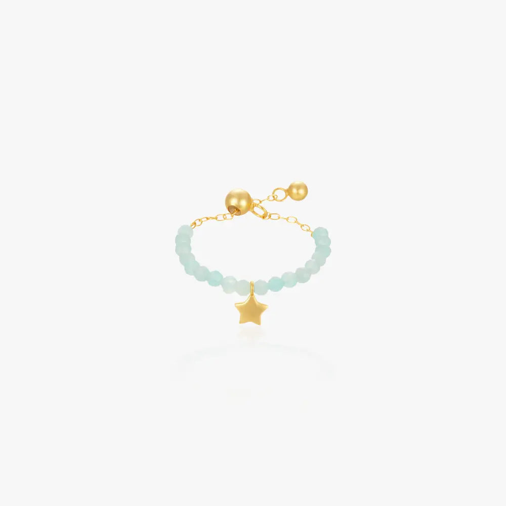 Aquamarine star beaded ring with gold adjustable chain, elegant and minimalistic design.