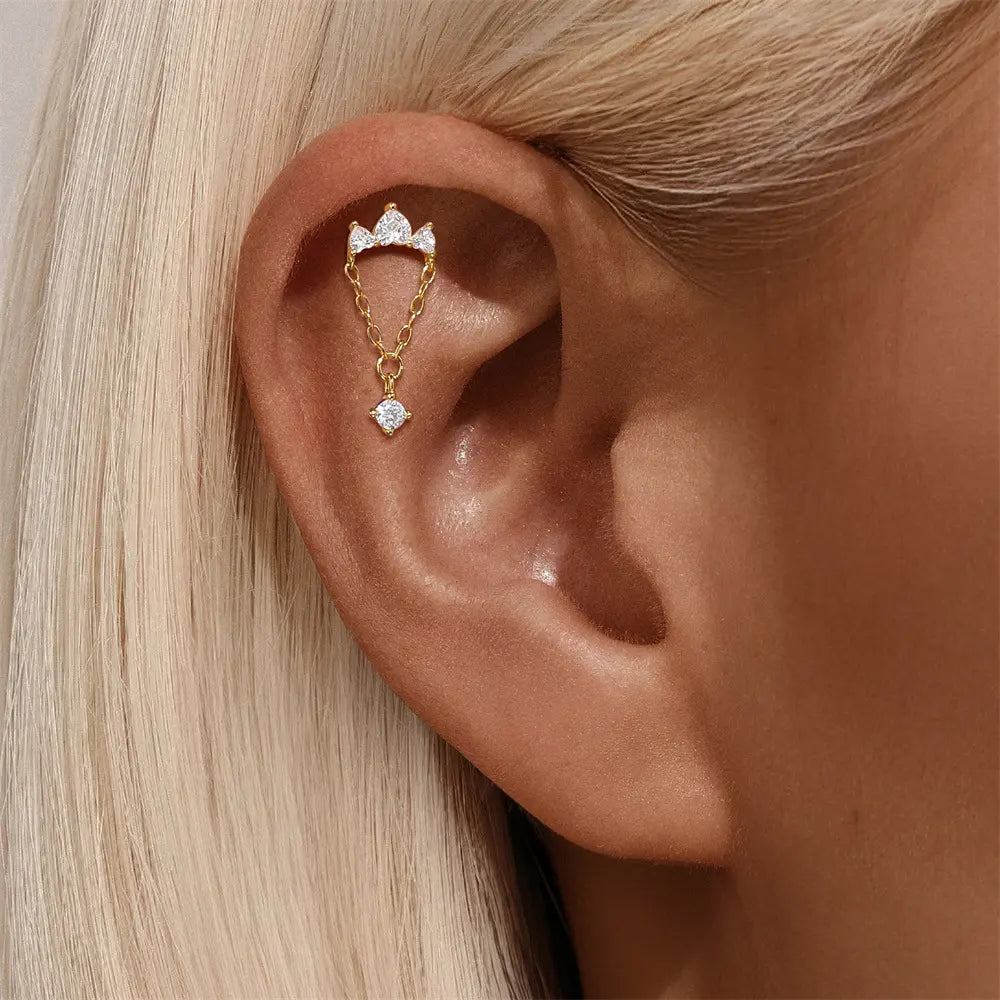 Model wearing S925 gold-plated stud earring with a chain drop design, showcasing elegance and sparkle