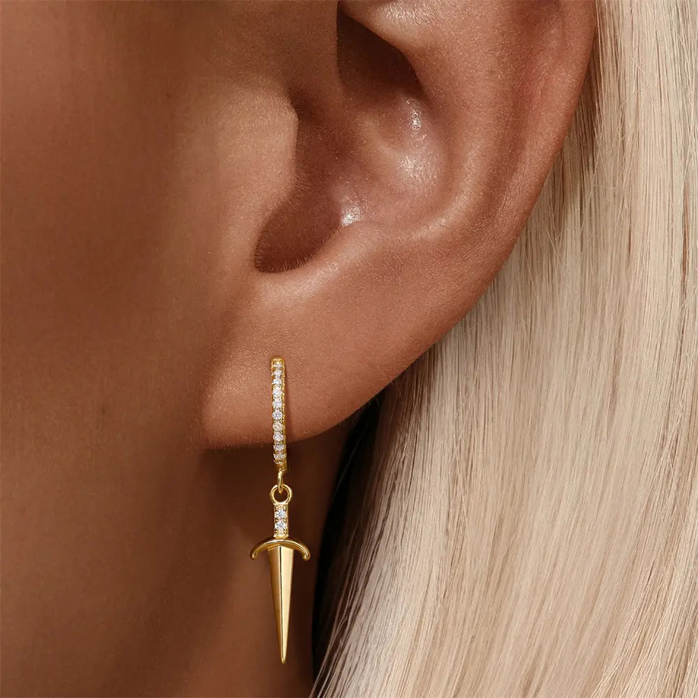 Model wearing 925 sterling silver dagger zircon earrings