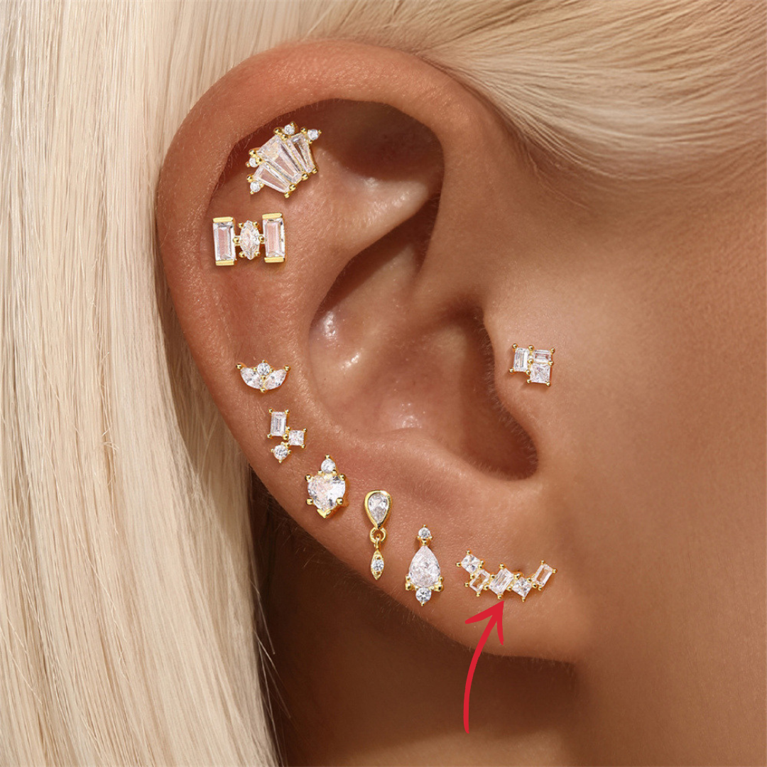 Dainty gold stud earring featuring a unique zircon design, ideal for stacking or everyday wear.