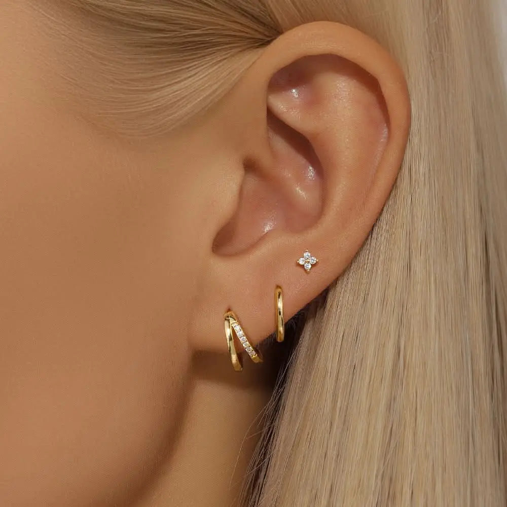 Double hoop gold earrings with diamond accent