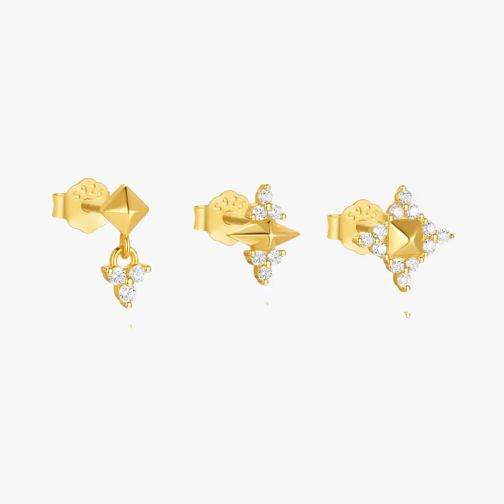 Set of three gold stud earrings featuring geometric pyramid designs with sparkling crystal accents, crafted in 925 sterling silver, perfect for a chic and modern look.