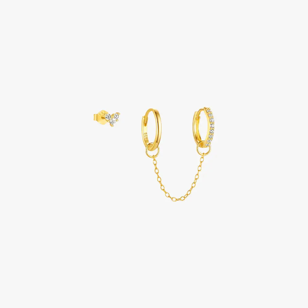 Gold butterfly and diamond huggie earrings with chain, chic and stylish accessory for any occasion.