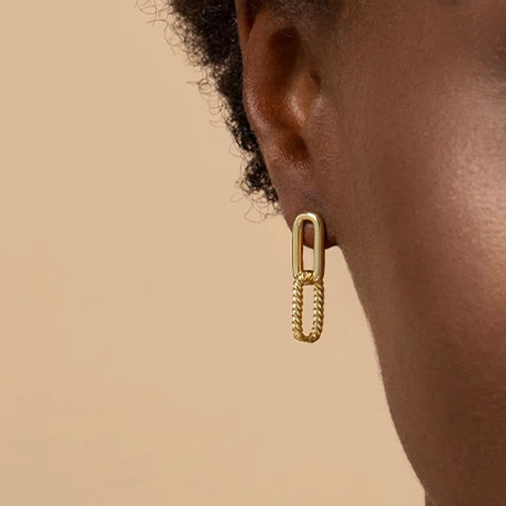 Gold chain link drop earrings on model, showcasing minimalist elegance for everyday fashion.