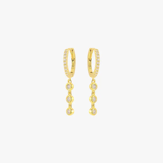 Gold crystal drop earrings for women, featuring a minimalist design with four bezel-set stones.