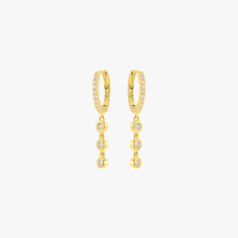 Gold crystal drop earrings for women, featuring a minimalist design with four bezel-set stones.