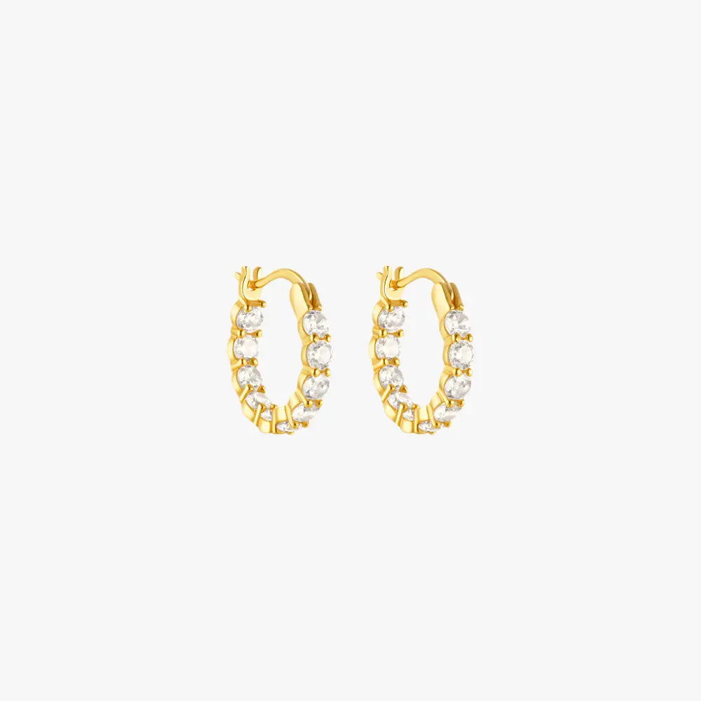 Gold hoop earrings featuring round-cut diamonds for a sophisticated look.