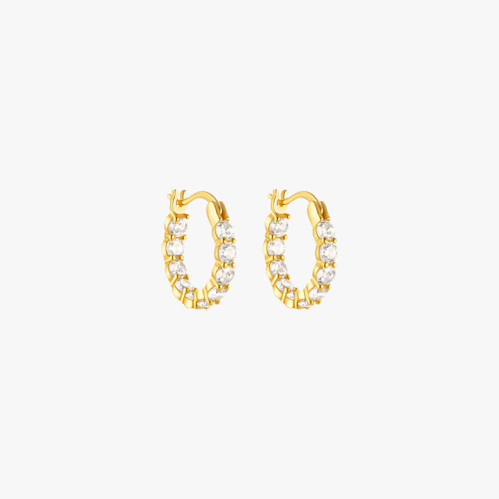 Gold hoop earrings featuring round-cut diamonds for a sophisticated look.