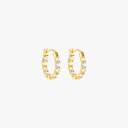 Gold hoop earrings featuring round-cut diamonds for a sophisticated look.