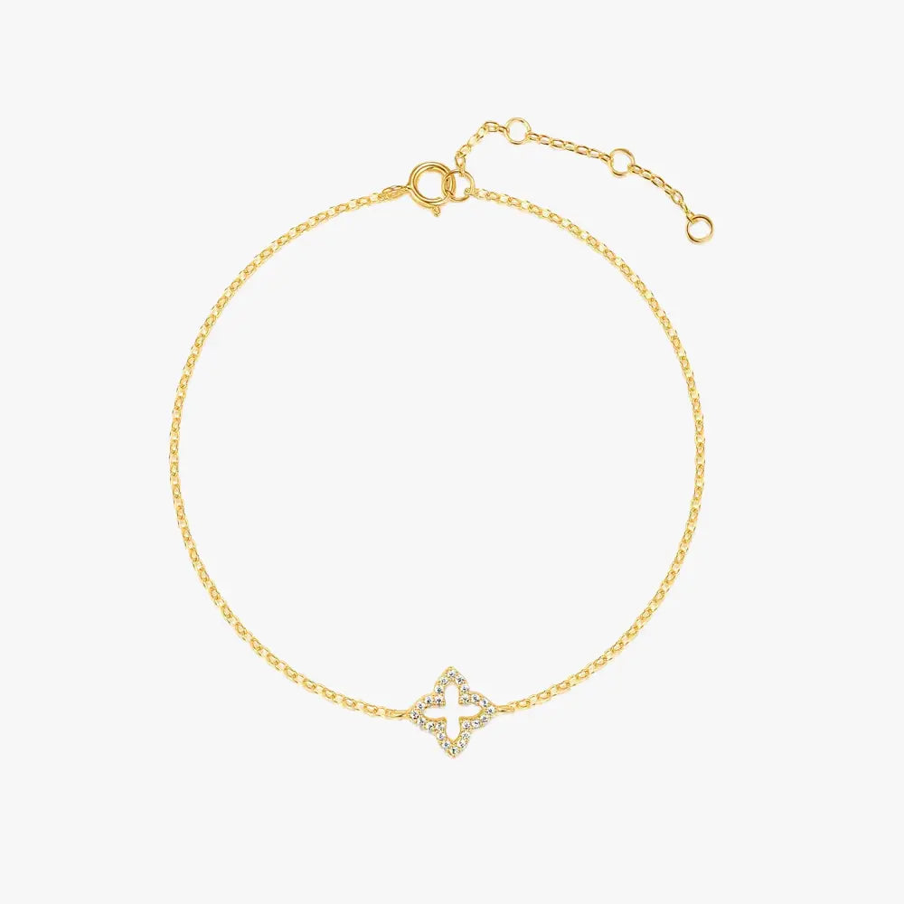 Gold flower bracelet featuring a diamond charm for a sophisticated style