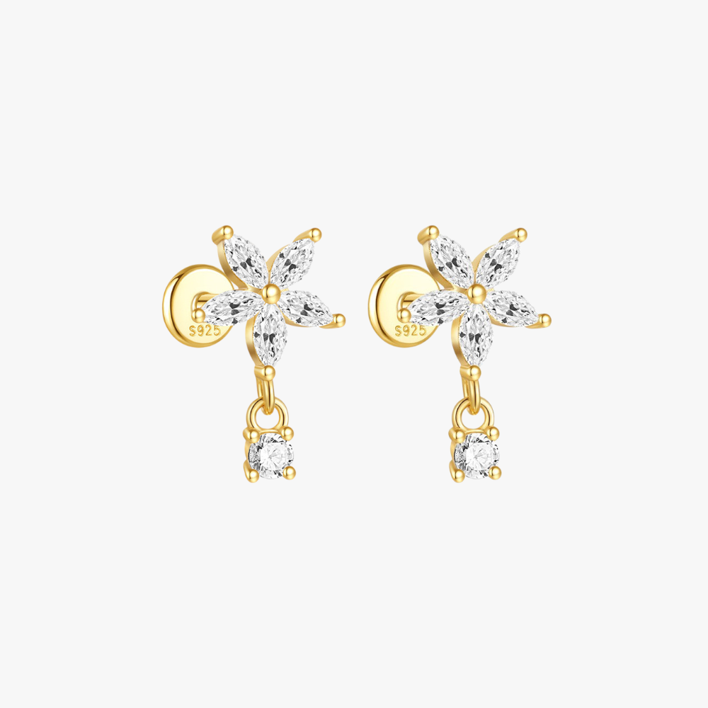 Gold flower cartilage earrings with dangling cubic zirconia, perfect for helix and conch piercings.