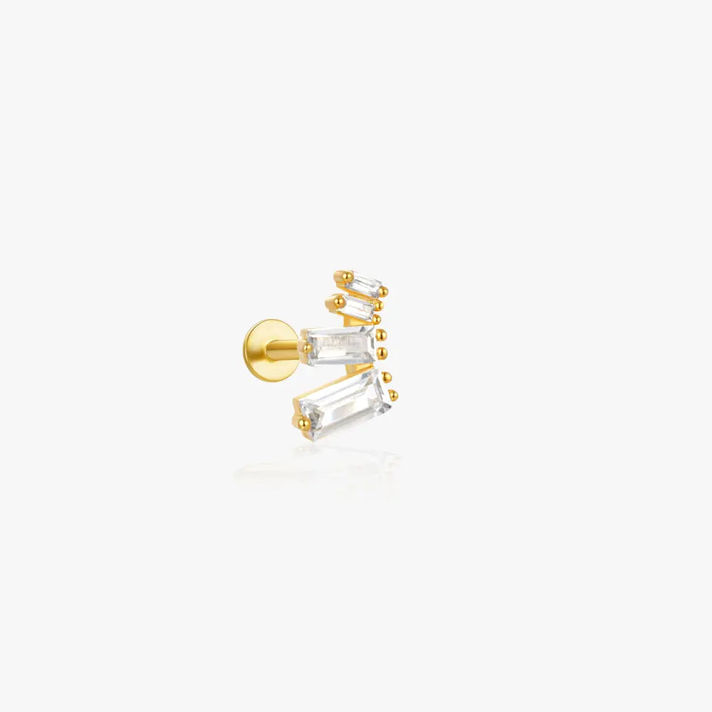 Gold geometric ear climber with baguette-cut stones for a modern and elegant look.