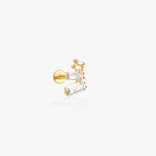 Gold geometric ear climber with baguette-cut stones for a modern and elegant look.